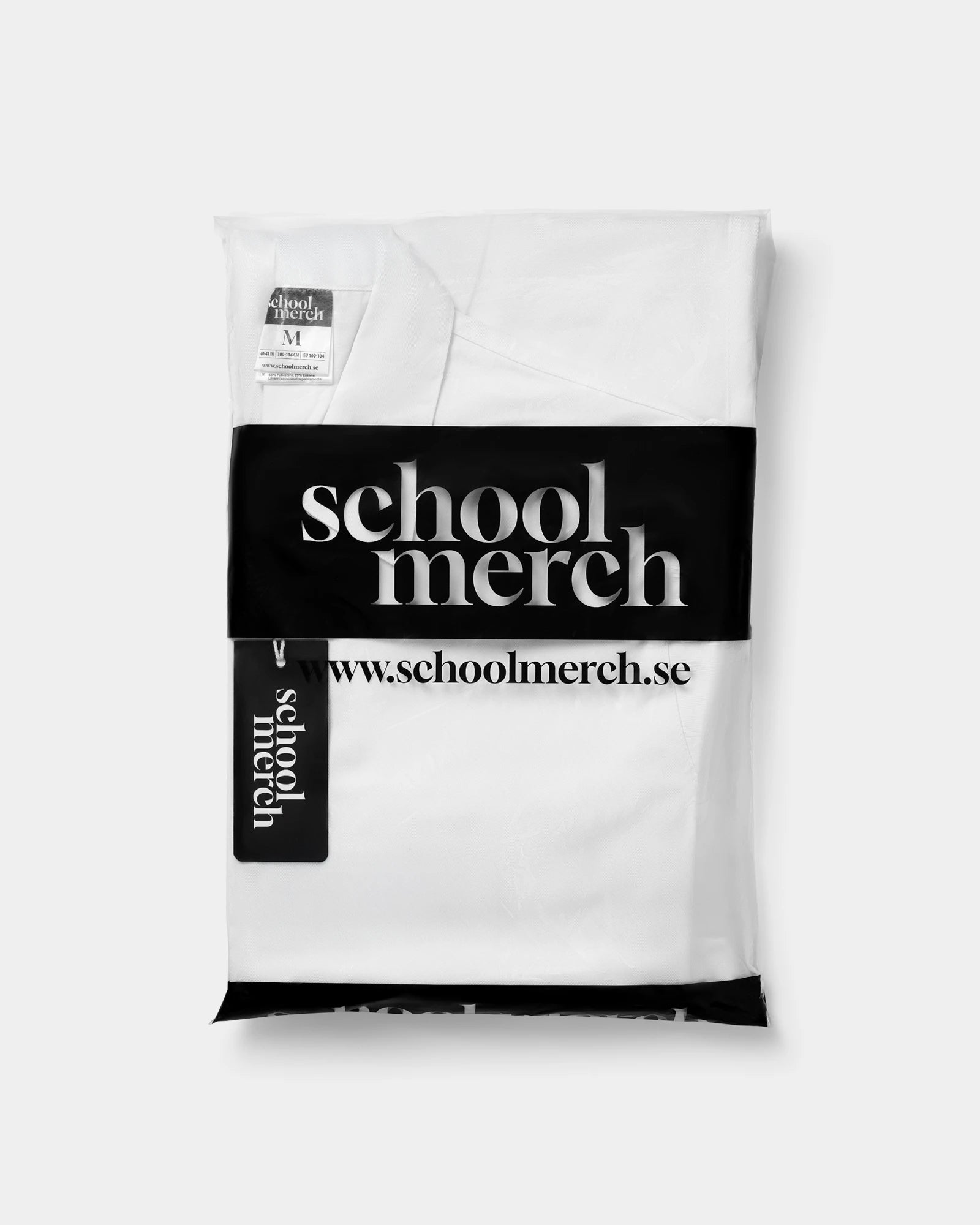 Vit studentoverall förpackad i påse – redo för studenten