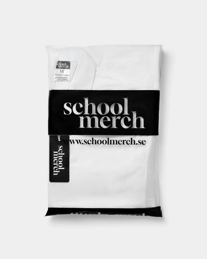 Vit studentoverall förpackad i påse – redo för studenten